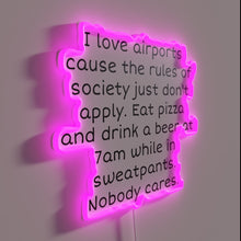 Charger l'image dans la galerie, Air travel vibes illuminated in bold, colorful RGB neon letters