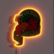 Charger l'image dans la galerie, Electrify your bar with this vibrant ammonite-inspired amber ale sign