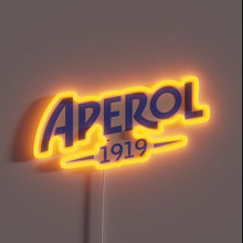 Charger l'image dans la galerie, Eye-catching Aperol brand logo illuminated in vibrant blue neon glow.