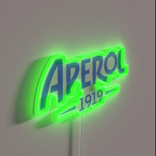 Charger l'image dans la galerie, Vibrant neon Aperol blue logo glowing in modern Italian style bar.