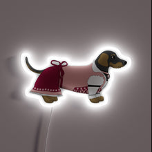 Charger l'image dans la galerie, Bavarian-inspired collectible dog figurine with vibrant neon LED lighting accents