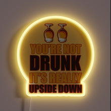 Charger l'image dans la galerie, Neon beer sign with upside-down letters in vibrant RGB colors