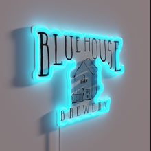 Charger l'image dans la galerie, Neon illuminated 'Blue House Brewery' sign with vibrant color accents.