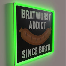 Charger l'image dans la galerie, Bratwurst enthusiast since birth proudly displays German sausage love loudly.