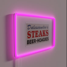 Charger l'image dans la galerie, Vintage Philly-inspired Dalessandro's cheesesteak logo in bold rainbow LED lights.