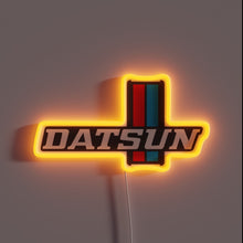 Charger l'image dans la galerie, Iconic vintage automobile logo illuminated in colorful RGB glow.