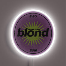 Charger l'image dans la galerie, Retro fruit sticker-style "Frank Ocean Blond 2016" neon sign with white glow.