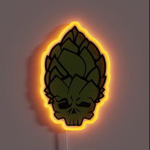 Charger l'image dans la galerie, hop-head-customneon-70840 – Neon wall sign shaped like a hop cone with a skull face, outlined in glowing orange light
