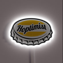 Charger l'image dans la galerie, Neon-lit HOPTIMIST bottle cap logo shines with vibrant RGB colors