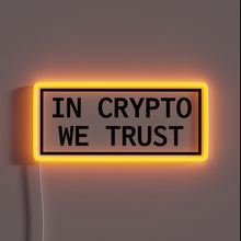 Charger l'image dans la galerie, Alt text: "Rectangular neon sign with the phrase 'IN CRYPTO WE TRUST' in bold black capital letters, surrounded by a glowing orange border."