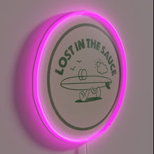 Charger l'image dans la galerie, Vibrant neon sign featuring stylized typography with sauce theme