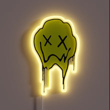 Charger l'image dans la galerie, Neon sign of a green melting face with X eyes and a frown.
