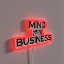 Charger l'image dans la galerie, Inspiring sober living with bright vibrant "Mind Your Business" neon signage.