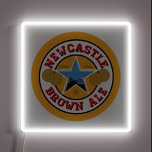 Charger l'image dans la galerie, Iconic Newcastle Brown Ale logo in vibrant RGB neon light