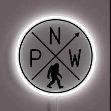 Charger l'image dans la galerie, Vibrant Pacific Northwest Sasquatch illuminated in colorful LED neon lighting.