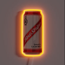 Charger l'image dans la galerie, Neon sign shaped like a Red Stripe Jamaica Lager Beer can with orange glow.