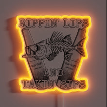 Charger l'image dans la galerie, Eye-catching RGB Neon Sign with Rippin Lips Customizable Artwork Display.