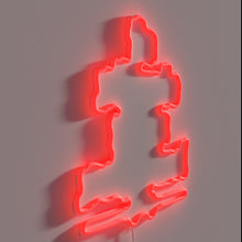 Charger l'image dans la galerie, Colorful Neon Sign Reads 'Schnitzel' in Fun German Font Style.