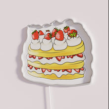 Charger l'image dans la galerie, Vibrant neon dessert display decoration with semi-realistic strawberry shortcake design