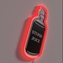 Charger l'image dans la galerie, Glowing 'Stupid' neon sign with colorful RGB lighting effects.