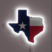 Charger l'image dans la galerie, Alt text: "Neon sign in the shape of Texas, filled with the Texas state flag design and glowing with a white border."