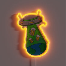 Charger l'image dans la galerie, Neon glow advertises extraterrestrial themed beer establishment in vibrant colors.