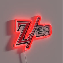 Charger l'image dans la galerie, Customizable Z28 Camaro logo illuminated in vibrant multicolor LED.