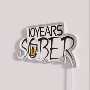 Colorful celebration of sobriety milestone with vibrant RGB neon lighting