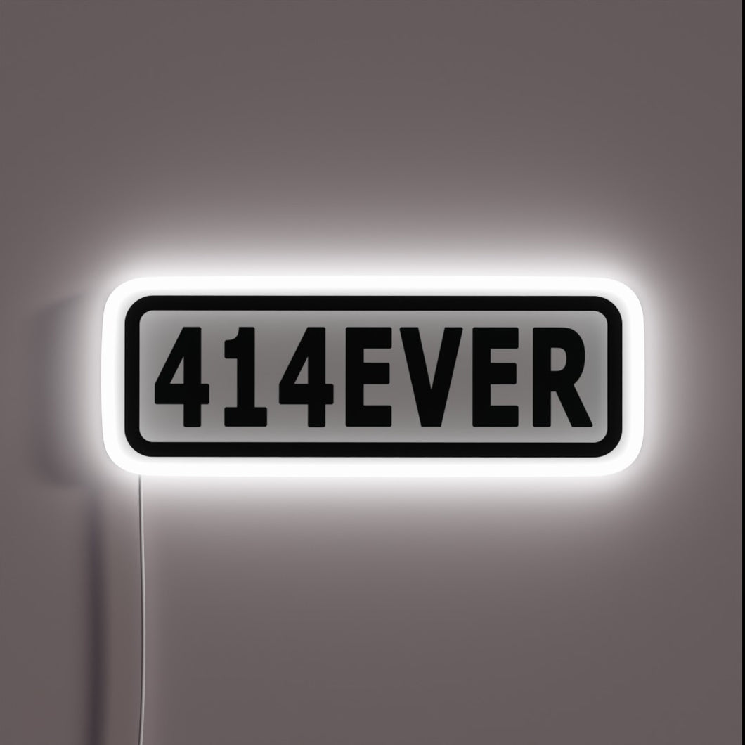 Vibrant 414EVER RGB neon sign for a modern gaming setup.