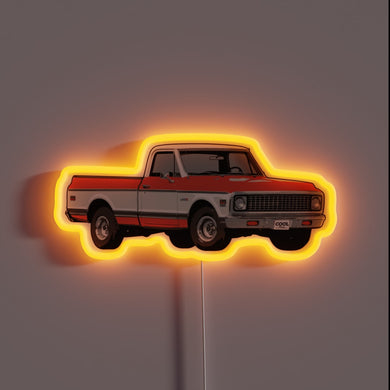 Vibrant Neon Sign Featuring a Colorful 1967-1972 Orange Chevrolet Truck Icon