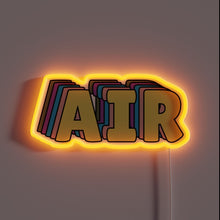 Charger l&#39;image dans la galerie, Alt text: &quot;Neon sign featuring the word &#39;AIR&#39; in bold, multi-layered block letters with a glowing orange outline and colorful 3D shadow effect.&quot;
