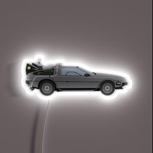 Charger l&#39;image dans la galerie, Back to the Future neon sign – featuring the iconic DeLorean time machine in sleek profile. A must-have wall piece for 80s fans, retro movie lovers, and sci-fi collectors.