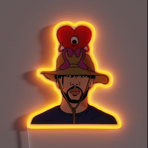 Bad Bunny neon sign – iconic cartoon-style with heart character on safari hat, glowing in warm orange.