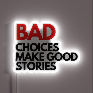 Bold and playful neon sign that reads “**BAD CHOICES MAKE GOOD STORIES**” – striking contrast with red and black text, glowing white border for emphasis. Perfect for a bar, game room, or party spot.