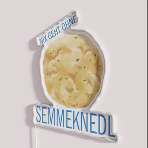 Vibrant Bavarian-inspired neon sign featuring a dumpling design in color.