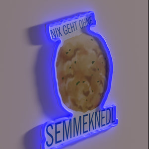 Vibrant RGB glow illuminates traditional German-inspired 'Bavarian Bread Dumpling' decorative sign.
