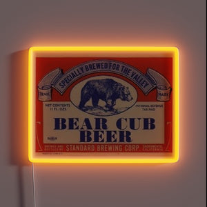 Vintage Bear Cub Beer neon sign with bear illustration.