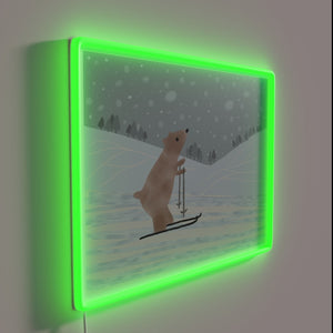 Cuddly bear enjoying winter skiing in colorful snowy mountain landscape