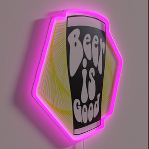Eye-catching neon sign reading 'Beer is Good' with colorful accents.