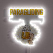 Charger l&#39;image dans la galerie, Neon Sign Glows Brightly Under Paraglider at Sunset Over Beach
