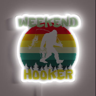 Vibrant retro neon advertising sign for fishing enthusiasts' weekend retreat.
