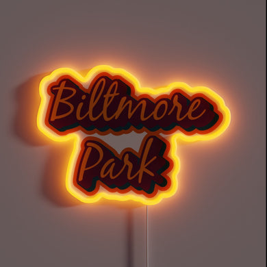 Brightly glowing RGB lighted sign featuring Biltmore Park logo
