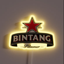 Charger l&#39;image dans la galerie, Indoor bar decoration featuring multicolor neon Bintang beer logo.