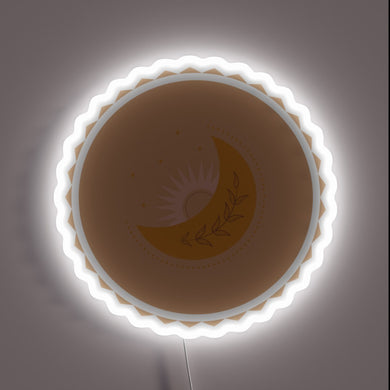 Boho-style moon and sun neon sign with leaf accents.