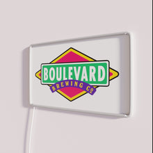 Charger l&#39;image dans la galerie, Boulevard logo illuminated in vibrant RGB color changing neon lighting