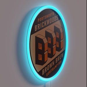 Neon bar decor with vibrant brown and blue beer lights.