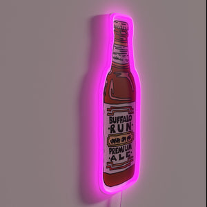 Neon illuminated bottle art decorates bar with beer theme ambiance