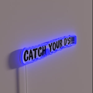 Glowing "Catch Your Dreams" LED Neon Sign in Vibrant RGB Colors.