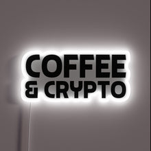 Charger l&#39;image dans la galerie, Neon sign with bold black text reading “COFFEE &amp; CRYPTO” outlined by a glowing white light.
