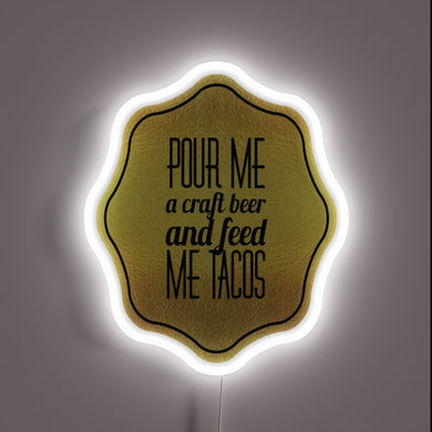 Vibrant Neon Sign Featuring A Beer and Taco Theme